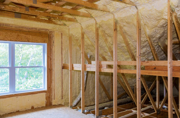 istock wall of an apartment attic, covered with insulation foam before 1171800519