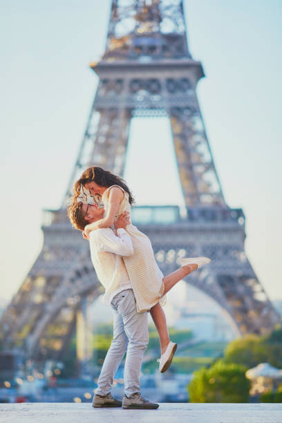 istock Happy romantic couple in Paris, near the Eiffel tower 1171800606