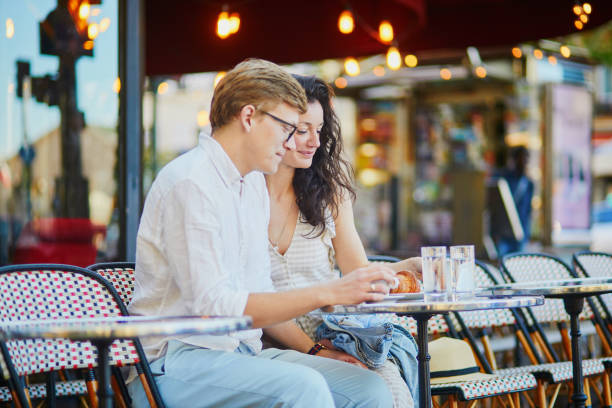 istock Happy romantic couple in Paris, drinking coffee 1171800706