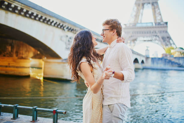 istock Happy romantic couple in Paris, near the Eiffel tower 1171800740