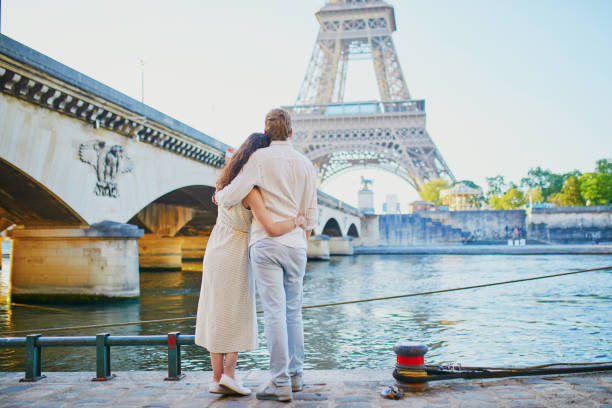 istock Happy romantic couple in Paris, near the Eiffel tower 1171800754