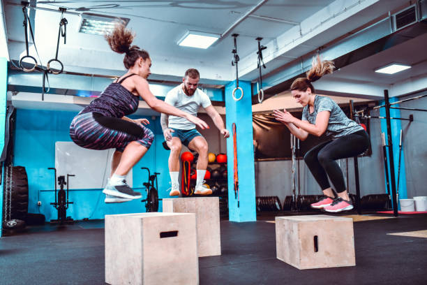 istock Sports Team Using Jump Boxes In Gym 1171802572