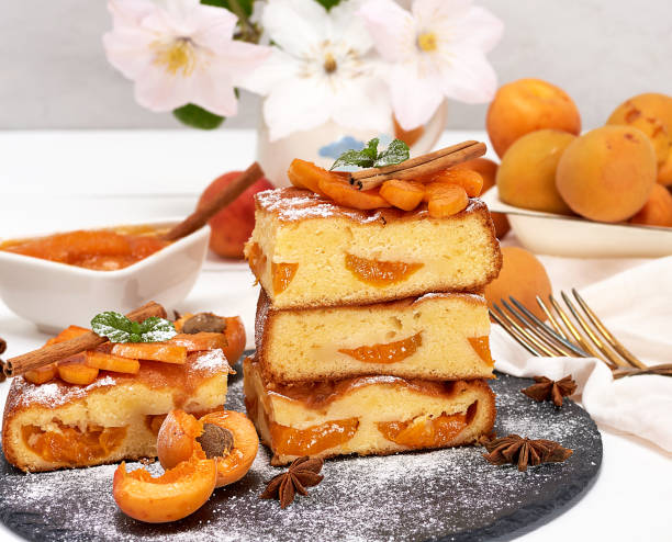istock biscuit pie with apricots and fresh fruit on a black graphite board 1171804009