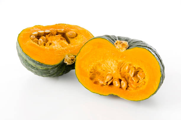 istock Half of the green pumpkin on white background 1171811846