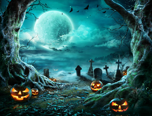 jack 'o lantern in cemetery in spooky night with full moon - cemetery imagens e fotografias de stock
