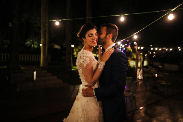 istock Happy newlywed couple dancing alone in the dance floor 1171817206
