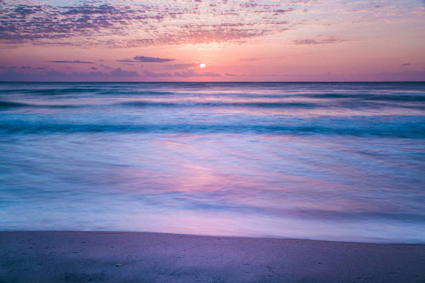 The golden peaceful seashore of Palm Beach, Florida at Sunrise on 7/1/2020.