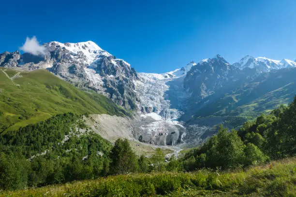 Photo of Svaneti landscape with glacier and snow-capped mountain in the back near Mestia