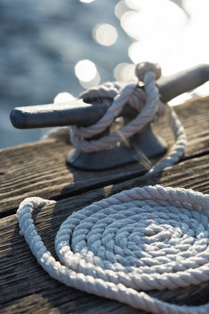 istock Mooring Rope Tieing up to Dock Cleat 1171823550