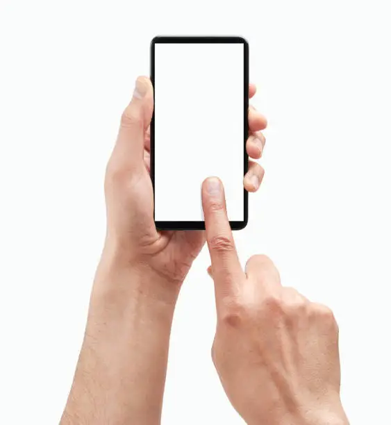 Cropped shot of an unrecognizable man hands holding and touching a blank mobile phone screen with her finger isolated on a white background