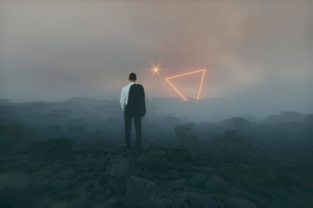 istock Lost businessman in mystery landscape 1171826963