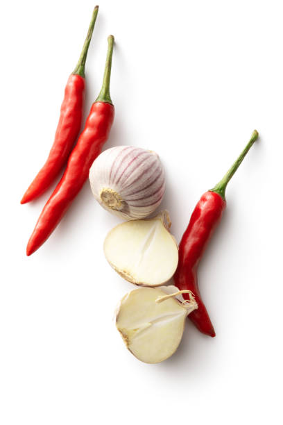 istock Vegetables: Asian Garlic and Red Chili Peppers Isolated on White Background 1171830208