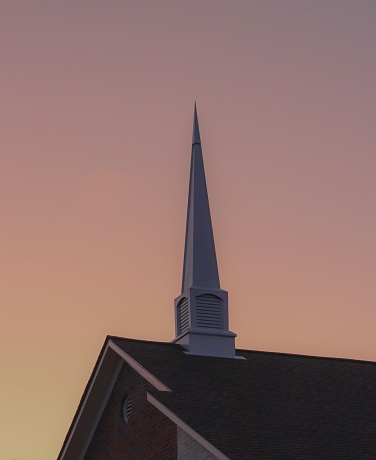 Old church steeple at sunset in East Texas next to the Shiloh road cemetery in Gregg county