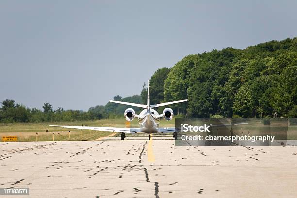 Jet On Runway Stock Photo - Download Image Now - Air Vehicle, Airplane, Airport Runway