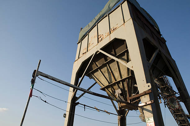 istock funnel and conveyor belt used for the unloading of cargo 117183743