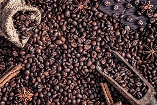 istock Background of coffee beans and chocolate 1171839230