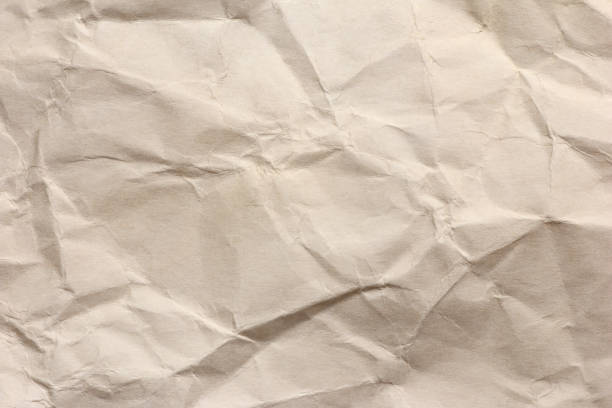 istock Clean brown paper, wrinkled, abstract for background. 1171839424