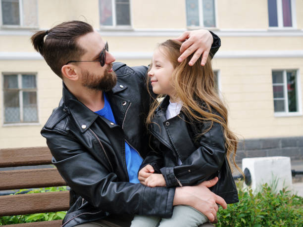 istock Dad and daughter walk around the city 1171839441