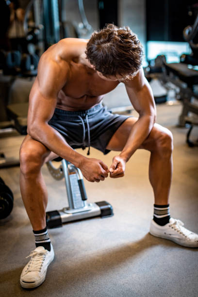 istock Mature man doing training in personal training gym 1171840305