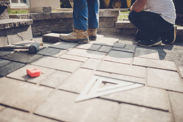 Installing paving stones is not an easy job