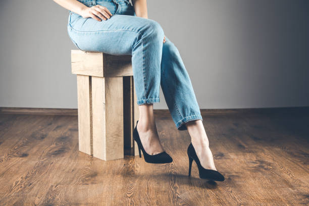 istock woman sitting on the chair 1171844537