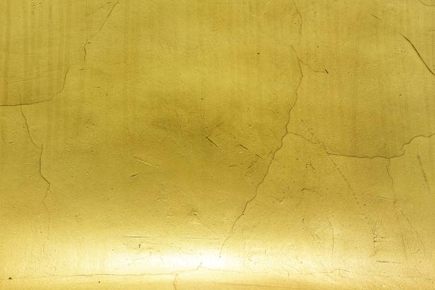 istock Golden concrete wall for backgrounds and textures. 1171851965