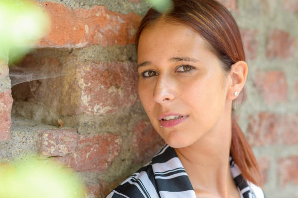 istock Serious woman glancing sideways at the camera 1171853926
