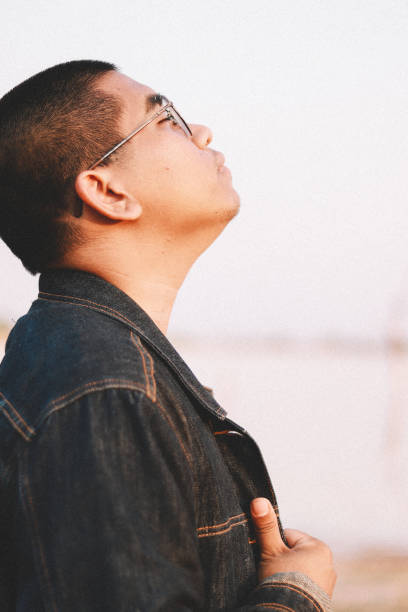 istock farmer in jean jacket 1171854173