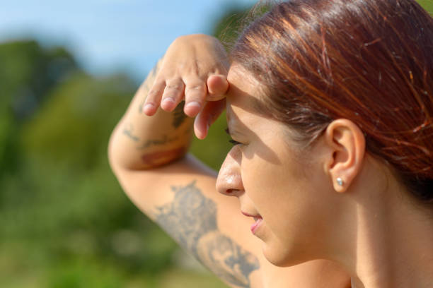 istock Attractive smiling woman keeping a look out 1171854209
