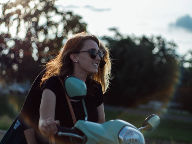 istock Cute Girl Riding the Motorcycle 1171854364