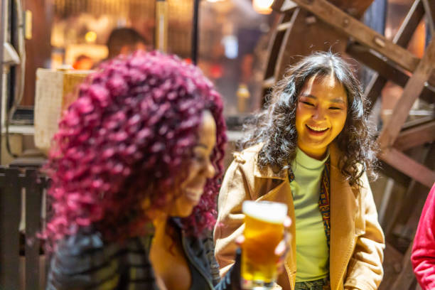 istock Mixed Race Group of Friends Having After Work Drinks 1171856472