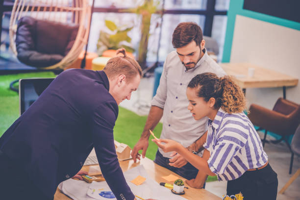 istock Team of young Architect Designer is brainstorming in office 1171858143