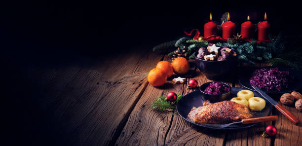istock Roast goose with baked apples, red cabbage and dumplings 1171858302