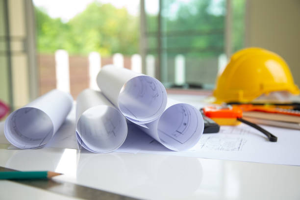 istock Desk of Architectural working project in construction site,With drawing equipment concept. 1171858402