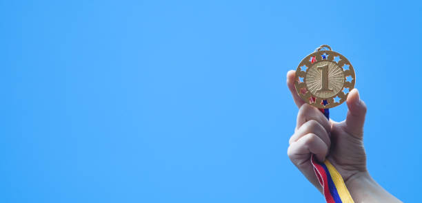 istock Hand showing medal. Sport, Winner, Success 1171859392