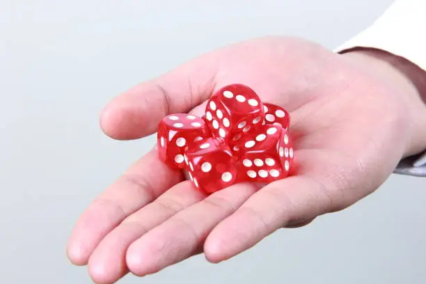 Photo of Dices in woman hand