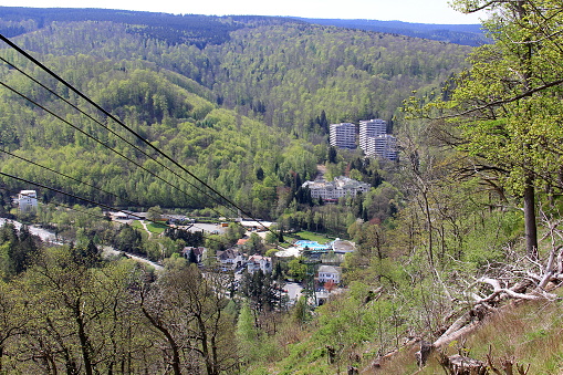 panoramic view of Bad Harzburg from the hill down with a cable car way across the picture