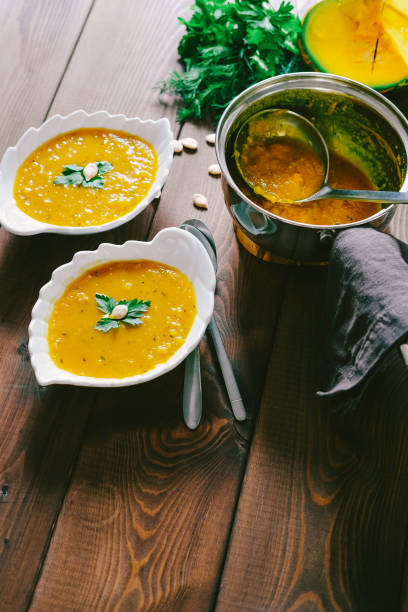 istock Delicious Pumpkin Soup On Wooden Tabletop 1171864433