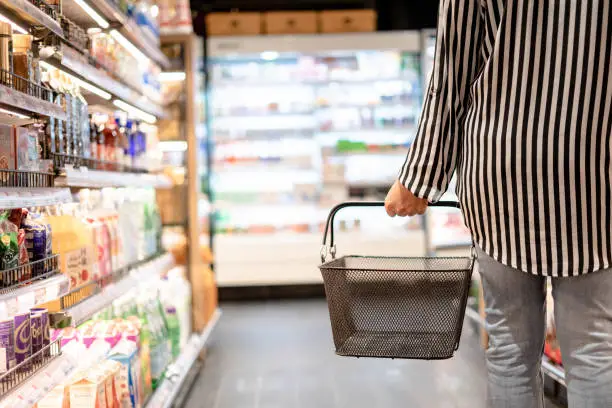 Women walking choose products in supermarkets, ready-to-eat food, shopping