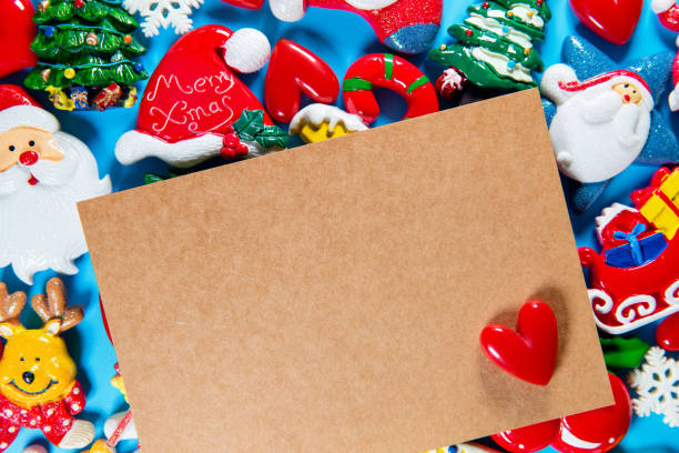 istock Christmas collection, brown paper and decorative ornaments background 1171866819