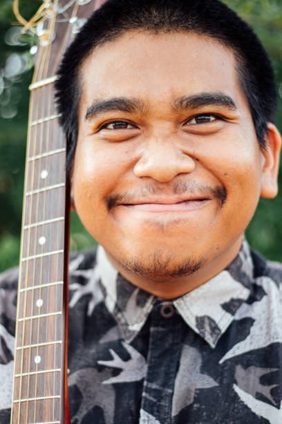 istock Young Brown Skin Guitarist From Thailand 1171866902