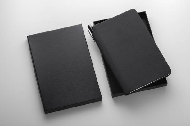 istock Black pu leather notebook in box with pen holder, mockup 1171868573