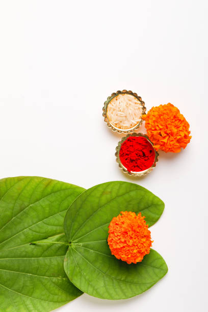 Happy Dussehra greeting card , green leaf and rice