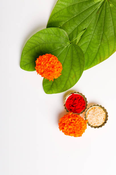 istock Happy Dussehra greeting card , green leaf and rice 1171869787