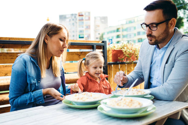 istock Family enjoying restaurant 1171870960