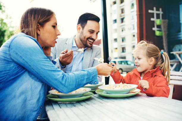 istock Family enjoying restaurant 1171871102