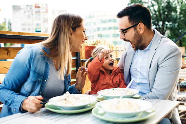 istock Family enjoying restaurant 1171871121