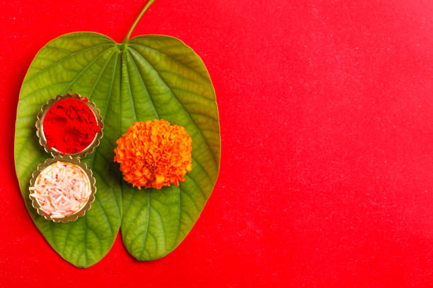 istock Happy Dussehra greeting card , green leaf and rice 1171871130