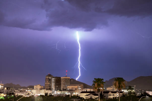 electrical storm lightning striking over downtown tucson arizona united states - valley storm thunderstorm mountain imagens e fotografias de stock