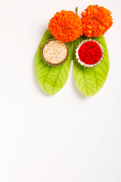 istock Happy Dussehra greeting card , green leaf and rice 1171872741